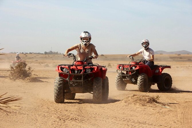 Merzouga Desert Quad bike Adventure with Sand boarding - Quad biking over Erg Chebbi dunes, with a guide keeping it fun