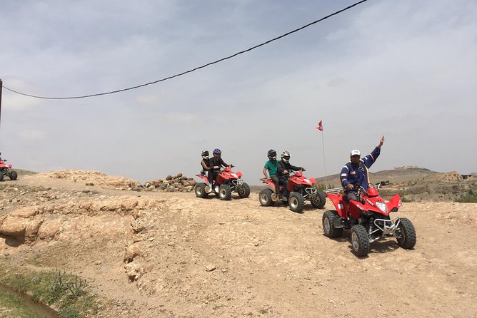 Quad biking excursion in The Desert Of Agafay & Lalla takerkoust - Stop 3: Agafay rock desert riding, river crossings, and photo freedom