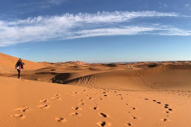 shared group Fez To Fez via Merzouga Desert Tour 2 Days/ 1 Night - Rissani stops: Zawiya Moulay Ali Ash-Sharif, Ziz Valley views, and Immouzar cave homes
