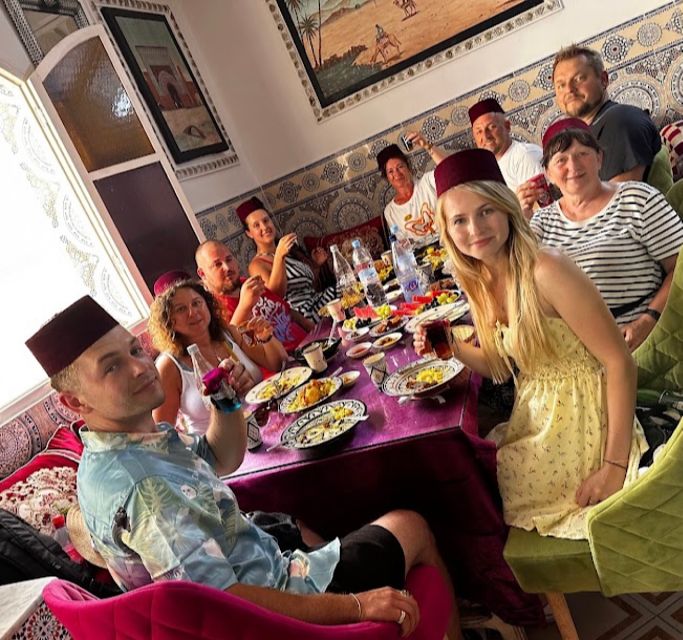 Tangier: Achakar Beach Sunset Camel Ride & Moroccan Dinner - Back toward the Medina: guided walk and the drink stop