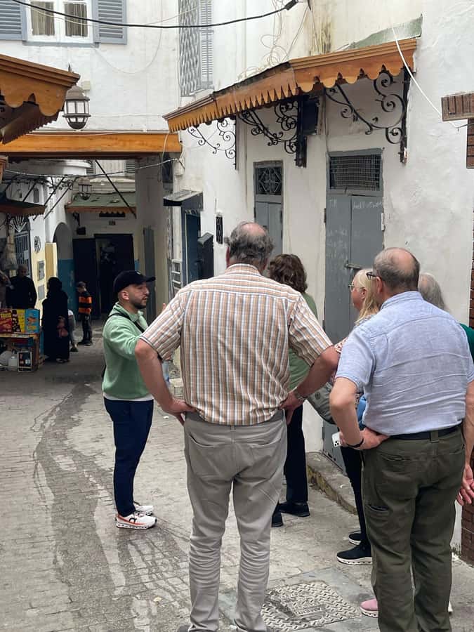 Tangier: Private Guided Walking Tour of the Tangier Medina - Portuguese fortress walls and the Medina lanes painted in color