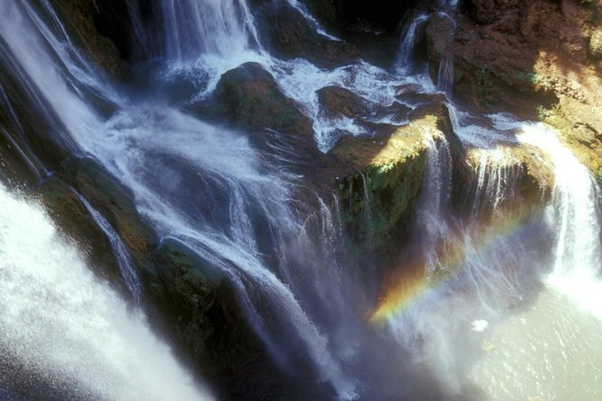 The waterfalls of Ouzoud - Boat Crossing at the Falls Basin: A Different View Fast